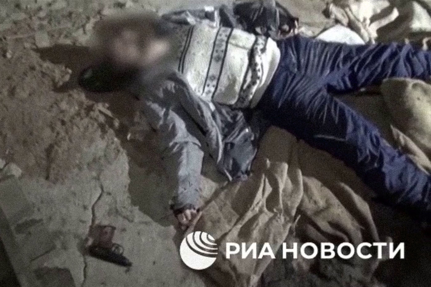 Screenshot from the FSB footage showing the body of a murdered person