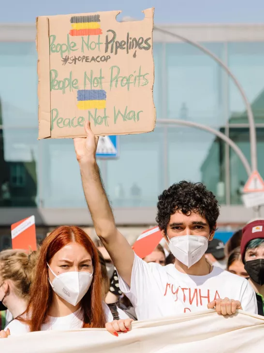 Polina Oleinikova and Arshak Makichyan at a protest in Berlin / Photo: Marie Jacquemin