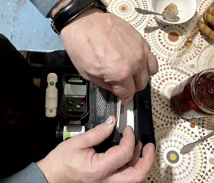 A pouch with medications, insulin and pulse monitor