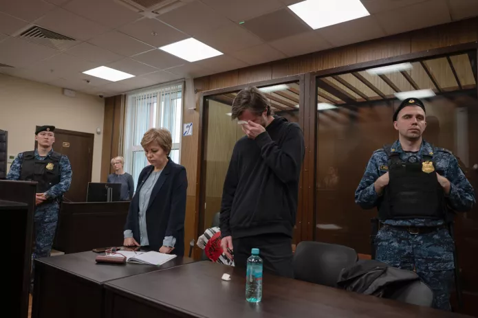 <em>Grigory Mumrikov with lawyer Svetlana Sidorkina in court during the announcement of the verdict / Photo: courtesy of Grigory’s friends</em>